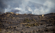 Firefighters work to contain a major wildfire near Trevillach, in the Pyrenees-Orientales...