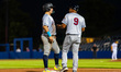 Julian Hernandez of the Mahoning Valley Scrappers and Raul Gonzalez, the manager of the Ma...