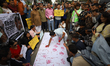 Protesters participate in a sit-in protest holding placards and slogans in Kathmandu, Nepa...