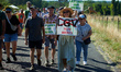 More than 1,000 people gather in the village of Bernos-Beaulac, Gironde, France, on July 4...