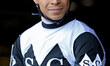 Jockey Jose Campos leaves the paddock ahead of the first race at Woodbine Racetrack in Tor...