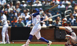 New York Mets player Francisco Lindor #12 doubles during the first inning of a baseball ga...