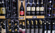 A bottle of Il Patto Aglianico del Vulture is displayed next to Fattoria il Palagio Chiant...
