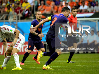 #9, Van Persie and #10, Sneijder, from Netherlands, and #16 Sergio Busquets, from Spain, in the #3 match of the 2014 World Cup, in Salvador,...