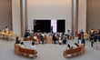 Customers interact with Apple products at the company's largest store in Asia in Shanghai,...