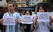 Educational consultancy operators stage a protest demanding the government withdraw what t...