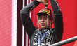 Kimi Antonelli of Italy celebrating on the podium his victory next to Charles Lecler (L) a...