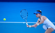 Maia Lumsden of Great Britain plays with partner Qianhui Tang of China during the Doubles...