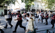 Officers from Albania's Special Police ''Shqiponja'' unit and riot police move toward demo...