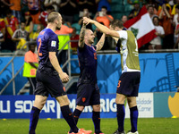 Netherland's Wesley Snijder (L) and Stefan de Vrij salute after the end of the #3 2014 World Cup match between Spain and Netherlands, in Sal...