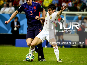 Stefan de Vrij (3) and David Silva (21) at the #3 2014 World Cup match between Spain and Netherlands, in Salvador, Brasil, this friday 13th...