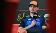 MOGYOROD, HUNGARY - JULY 26: 
Max Verstappen of the Netherlands and Red Bull Racing speak...