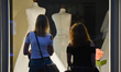 Two young ladies look at the shop window with Wedding Dresses on Friday, 2nd September 201...