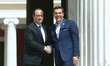 Greek PM Alexis Tsipras (R) wellcomes French President François Hollande. Summit of the Eu...
