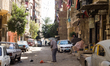An old man is sweeping the street in front of his house Thursday, September 15, 2016 Old C...