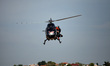 Jetman Yves Rossy holds himself out of a helicopter in Athens Flying Week 2016, Tanagra, G...