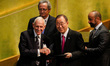 William Lacy Swing (L front), Director General of the International Organization of Migrat...