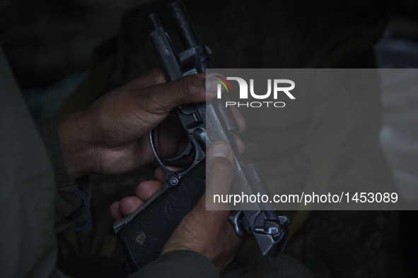 Thus begins the day of some guerrillas from FARC EP, cleaning and preparing their armament in Llanos del Yari, a town in an Indigenous regio...