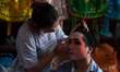 October 1, 2016. a Chinese opera troupe apply make-up before performing at Joe Sue Kung Sh...