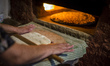A housewife is making traditional Lezgi bread in Khazra village, Qusar district, Azerbaija...