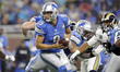 Detroit Lions quarterback Matthew Stafford (9) looks to pass during the first half of an N...