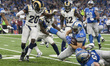 Detroit Lions fullback Zach Zenner (34) runs the ball during the first half of an NFL foot...