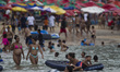 Bathers overcome fear to swimming at the beach of Boa Viagem, Recife in northeastern Brazi...