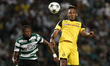 Dortmund's forward Aubameyang (R) vies for the ball with Sporting's defender Ruben Semedo...