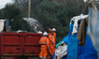 Construction workers demolish during the eviction of the Calais Jungle a hut  in Calais, F...