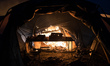 The fire of a burning hut flash over in the Calais Jungle on a tent  in Calais, France, on...