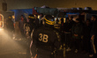 Police officers block a road in the Calais Jungle  in Calais, France, on 25 October 2016....