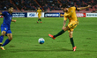 Australian football player Jamie Maclaren attempt on goal whilst for the ball against Thai...
