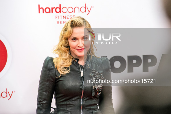 Madonna is in Berlin to the opening of her personal trainer Gym. Nicola Winhoffer opens the new "Hard Candy Fitness" in Berlin, on October 1...