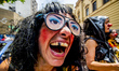 Clowns make a grumpy protest against the austerity package of the Temer government, in Sao...