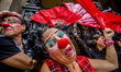 Clowns make a grumpy protest against the austerity package of the Temer government, in Sao...
