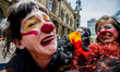 Clowns make a grumpy protest against the austerity package of the Temer government, in Sao...