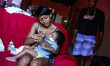 Allan Miguel dos Santos, 10 months old, apparently healthy, his parents Brenda Ketle (17 y...