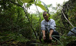An elderly women take part of planting thousands of tree seedlings at the foot of Mt. Apo...