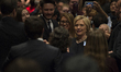 Democratic presidential candidate Hillary Clinton takes photos with supporters after a ral...