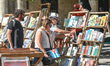 A street stand with books, posters, suvenirs and memorabilia for sale, in Havana's city ce...