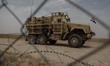 An Iraqi Mine-Resistan Ambush Protected vehicle, or MRAP, along the frontline in Makhmour,...