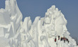 Chinese workers carve a large snow sculpture "Love Song" for the 29th Harbin Sun Island In...