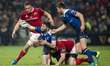 Barry Daly and Ross Byrne of Leinster fight for the ball with Darren Sweetnam and Tommy O'...