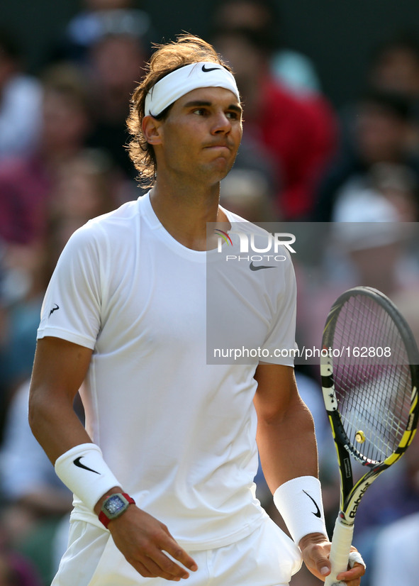 (140702) -- LONDON, July 2, 2014 () -- Spain's Rafael Nadal reacts during the men's singles fourth round match against Australia's Nick Kyrg...