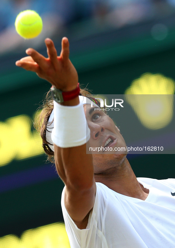 (140702) -- LONDON, July 2, 2014 () -- Spain's Rafael Nadal serves the ball during the men's singles fourth round match against Australia's...