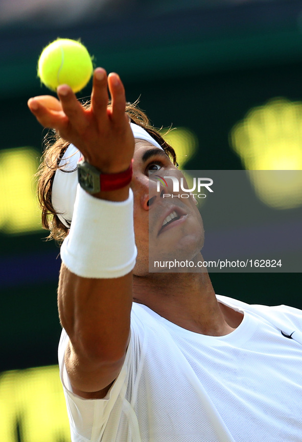 (140702) -- LONDON, July 2, 2014 () -- Spain's Rafael Nadal serves the ball during the men's singles fourth round match against Australia's...