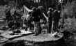 Activists digging a trench in the road to prevent passing of police cars. Notre-Dame-des-L...