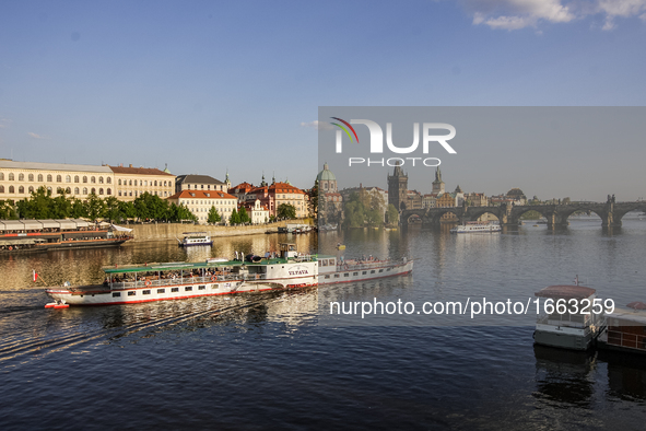 Ship passing  the Vltava river in front of Charles bridge is seen on 1 May 2012 in Prague (Praha) Czech Republic capital.  by Michal Fludra/NurPhoto