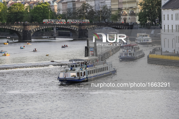 Ships passing  the Vltava river in front of Charles bridge are seen on 1 May 2012 in Prague (Praha) Czech Republic capital.  by Michal Fludra/NurPhoto