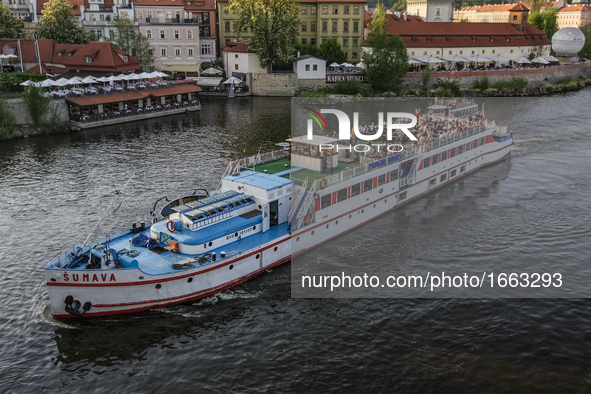 Ship passing  the Vltava river in front of Charles bridge is seen on 1 May 2012 in Prague (Praha) Czech Republic capital.  by Michal Fludra/NurPhoto
